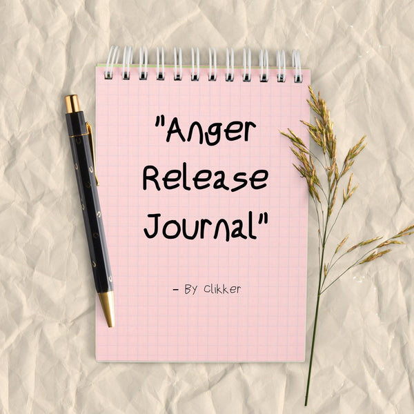 Pink 'Anger Release Journal' with a pen on a textured beige background
